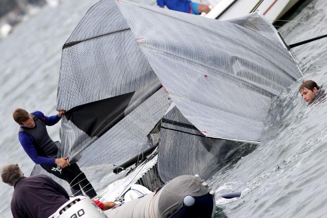 Ash Rooklyn and his team sorting out the problem after a collision with the Manly Ferry - 2015 NSW 18ft Skiff Championship © Frank Quealey /Australian 18 Footers League http://www.18footers.com.au